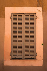 close up of old French widow shutters