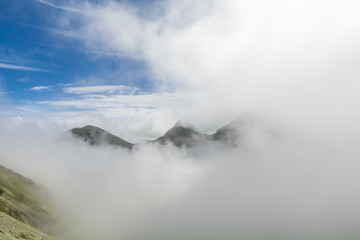 Disappearing mountain peaks