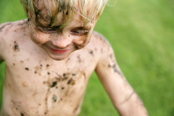 Happy Dirty Toddler Child PLaying Outside
