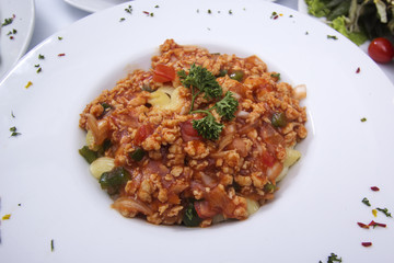 Macaroni with tomato chicken sauce