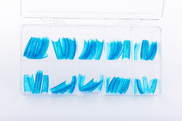 Blue tips used in manicure for creating artificial nails