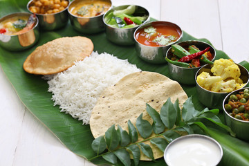 south indian meals served on banana leaf