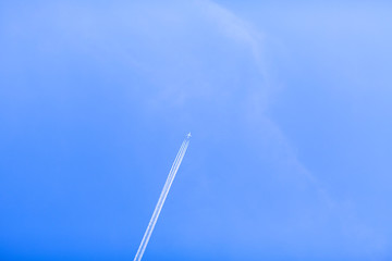 Jet airplane on blue sky