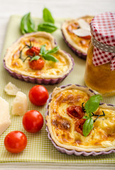 Quiche with cheese and cherry tomatoes