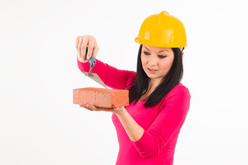 young woman with construction helmet