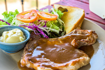pork steak and vegetable salad