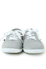 Pair of grey shoes isolated on white