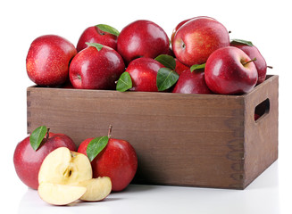 Red apples in wooden crate isolate on white