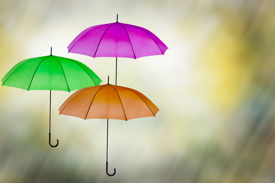 Wet weather sunny period umbrella background