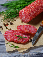 Sliced italian salami with rosemary