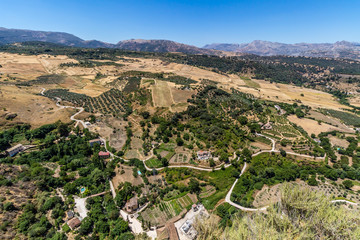 Fototapeta na wymiar Andalusia landscape, countryside road and rock in Ronda, Spain 