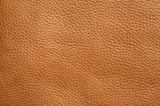 Brown leather texture closeup. Horizontal view