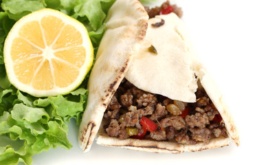 healthy eating: served grilled beef taco with vegetables, salad, lemon and copy space
