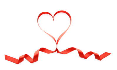 Red ribbon in shape of heart isolated on white