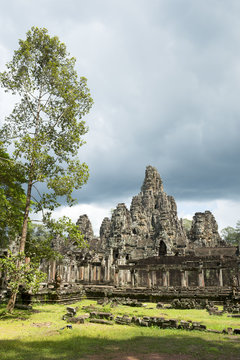 Angkor Temple of Bayon with surrounding greenery in the Angkor Thom complex
