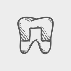 Crowned tooth sketch icon