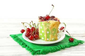 Tasty pudding with cherries on table close up