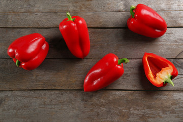 Red peppers on rustic wooden background
