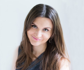 Fototapeta premium Portrait of an attractive fashionable young brunette woman
