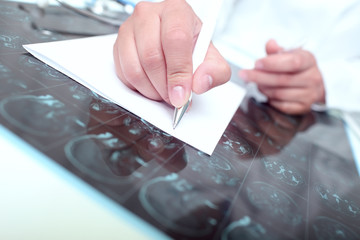 Doctor wrote on a paper