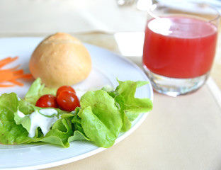 Healthy breakfast, watermelon juice and fresh vegetables with bread