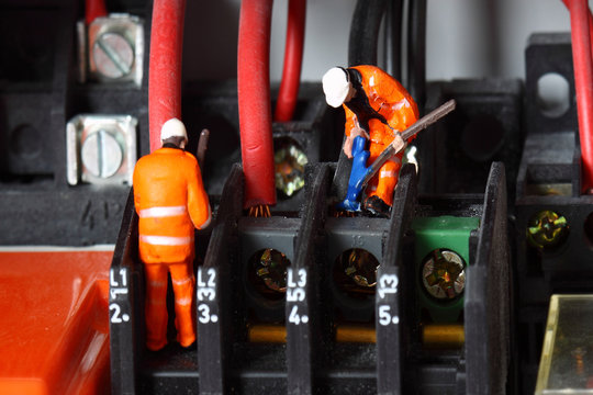 Miniature construction figures wiring circuit.
Miniature scale model construction figures wiring circuit.