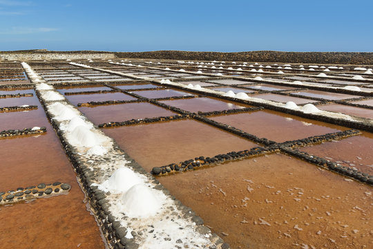 Salt pans still in use at El Carmen Salinas and Salt Museum on the east coast, Caleta de Fuste, Fuerteventura, Canary Islands, Spain