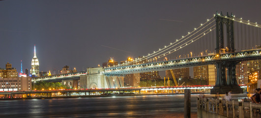 Fototapeta na wymiar Panoramic View Manhattan Bridge and Manhattan Skyline at Night