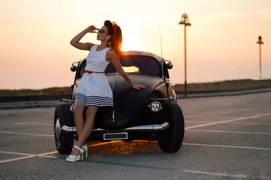 Very beautiful pin-up at sunset