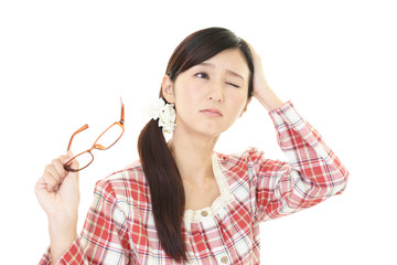 頭痛を訴える女性