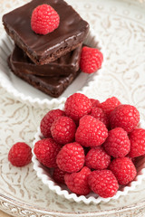 Ripe sweet raspberries and chocolate browny