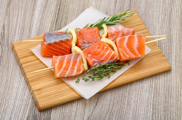 Raw salmon skewers
