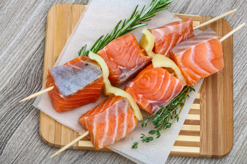Raw salmon skewers