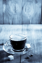 cup of coffee on wood
