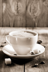 cup of coffee on wood