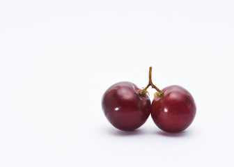 Fototapeta na wymiar red grape isolated on white