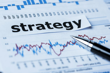 strategy concept with financial graphs and charts