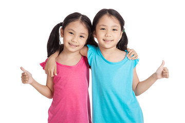 Happy Asian twins girls  smile show thumbs up