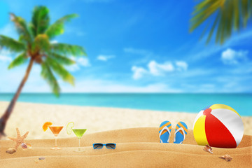 Fototapeta na wymiar summer accessories on sandy beach
