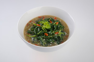 Vegetable soup on isolated white