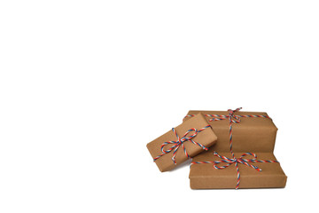 Packages wrapped in brown paper isolated on white background with copy space