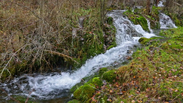 Natural   waterfall at river  in winter. Cuenca, Spain