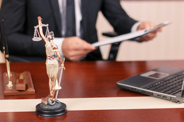 Nice lawyer holding papers 