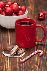 Mug Of Tea Or Coffee. Sweets. Christmas Decorations. Red Balls A