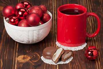 Mug Of Tea Or Coffee. Sweets. Christmas Decorations. Red Balls A