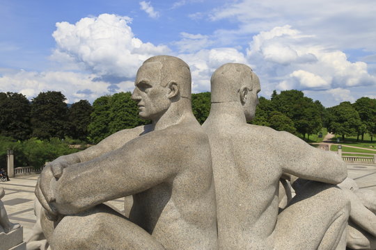 Back to back, detail of a sculptural group on the Monolith Plateau by Gustav Vigeland, Frogner Park, Oslo