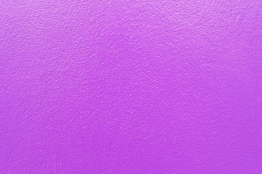 Purple paint on concrete wall texture background