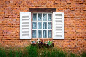Fototapeta na wymiar Walls, windows and flowers