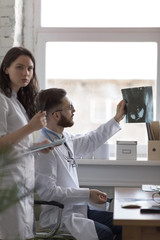 Fototapeta premium Doctors discussing intestines