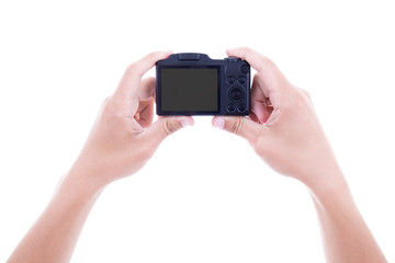 male hands holding digital camera with blank screen isolated on